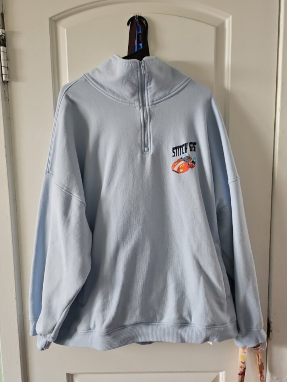Disneys stitch sweater